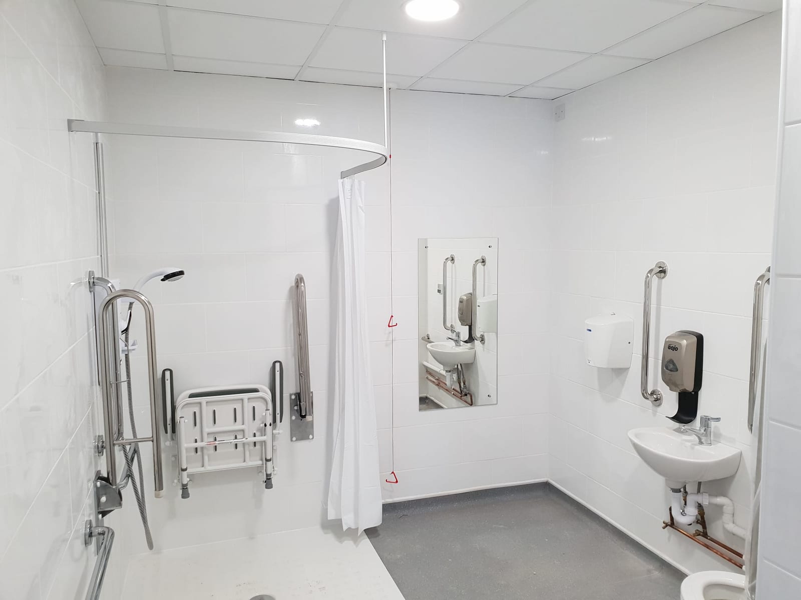 Accessible wet room with grab rails
